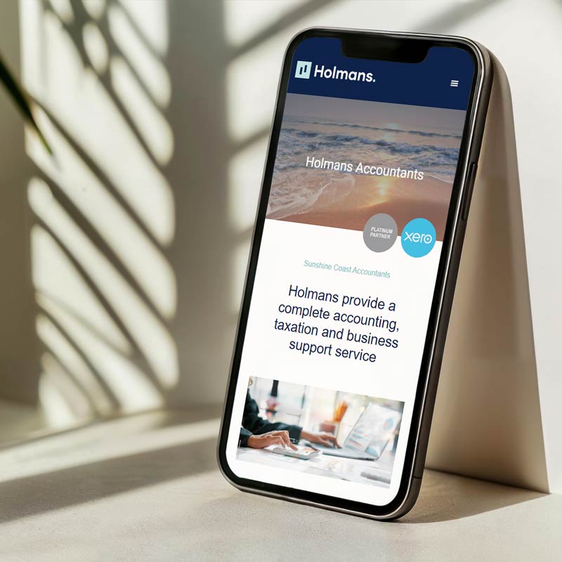 Sunshine Coast website design displayed on mobile device – IC Creative Design