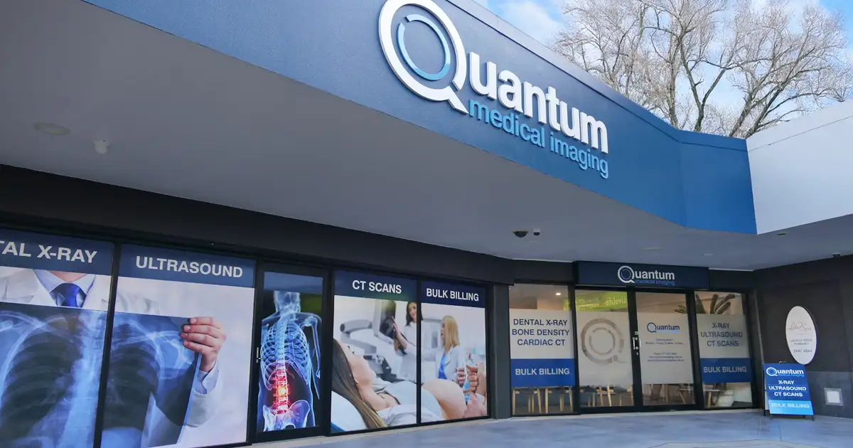 Exterior building signage and window graphics for Quantum Medical Imaging
