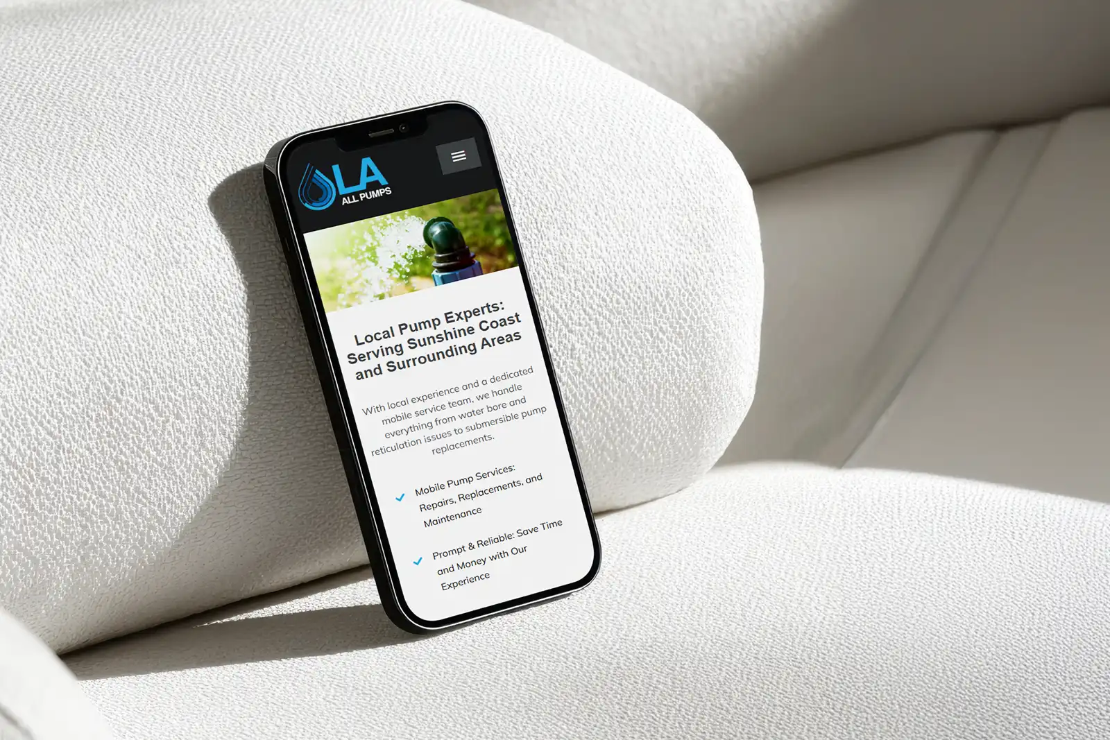 LA All Pumps Sunshine Coast website design displayed on mobile device