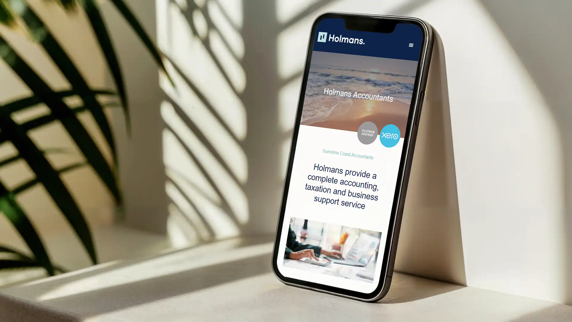 Mobile-first Noosa web design example displayed on smartphone