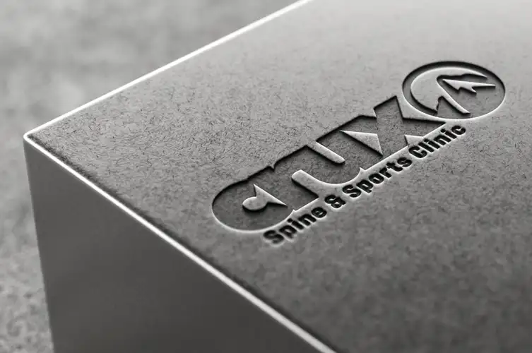 Crux Spine & Sports Clinic Logo – Embossed Print Application Crux Spine & Sports Clinic logo embossed on premium print material